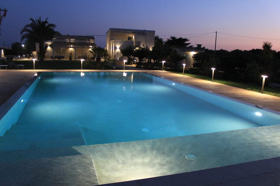 Property building, Night, Pool view, Swimming pool