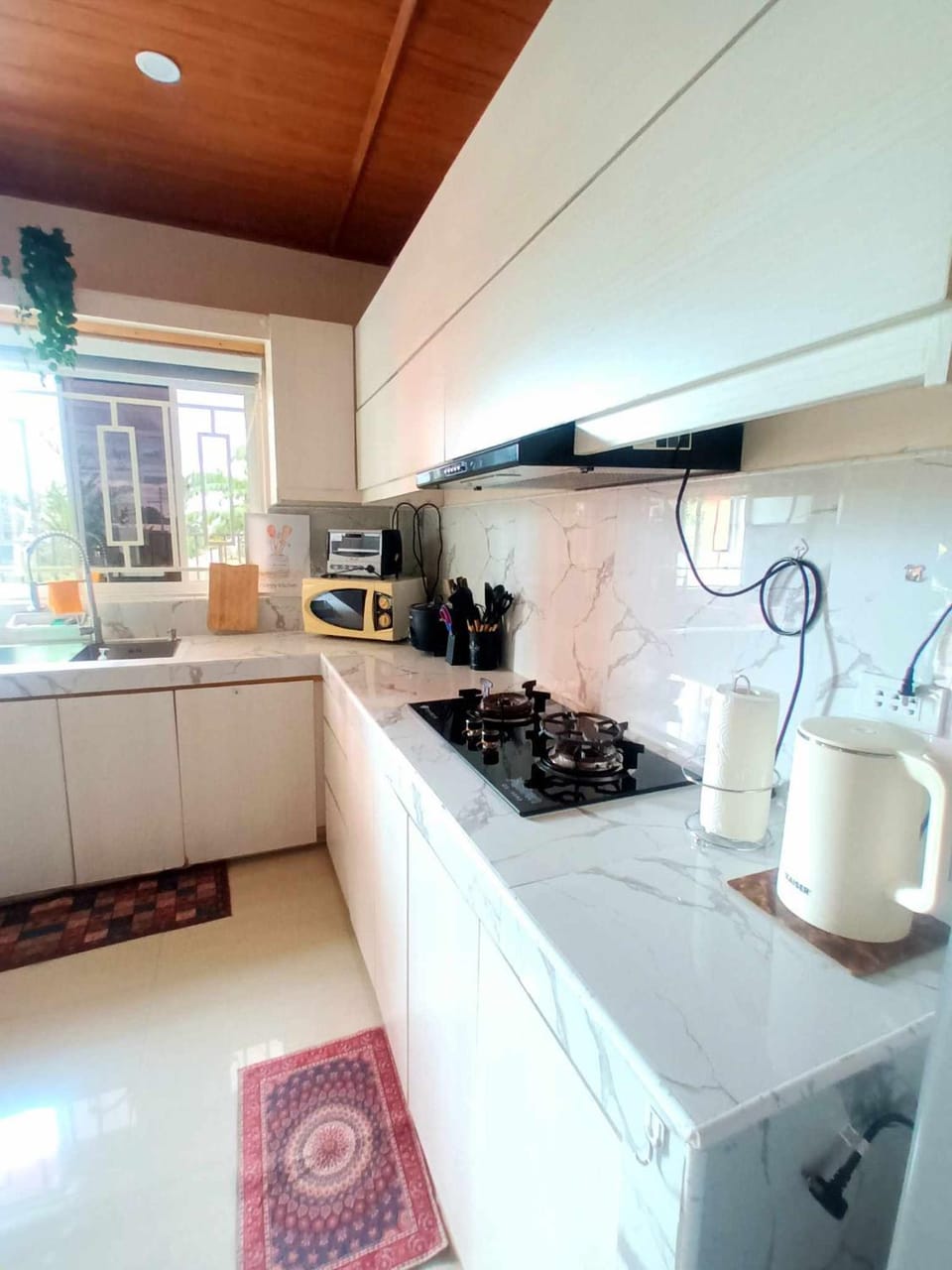 Kitchen or kitchenette, stove, toaster