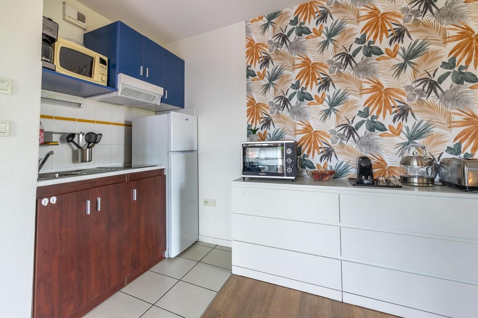 Kitchen or kitchenette, stove
