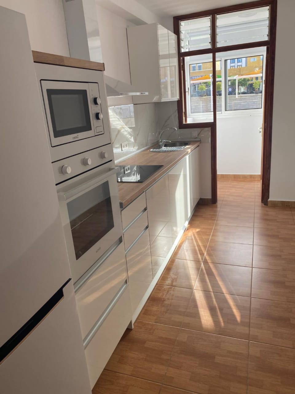 Kitchen or kitchenette, oven, stove