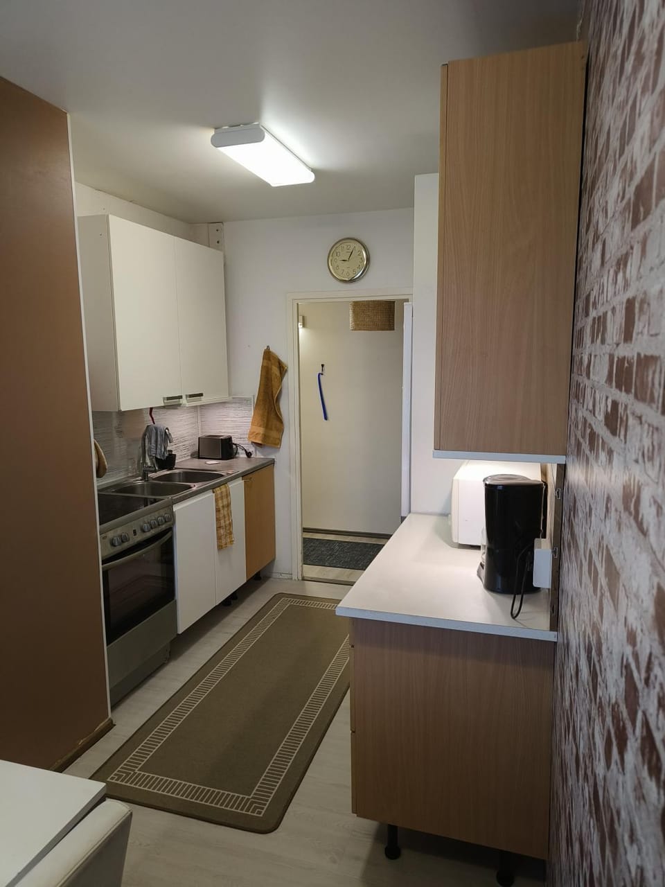 Kitchen or kitchenette, microwave, oven, stove, toaster