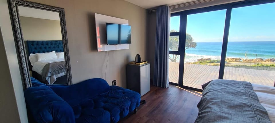 Bed, TV and multimedia, View (from property/room), Beach, Bedroom, Sea view