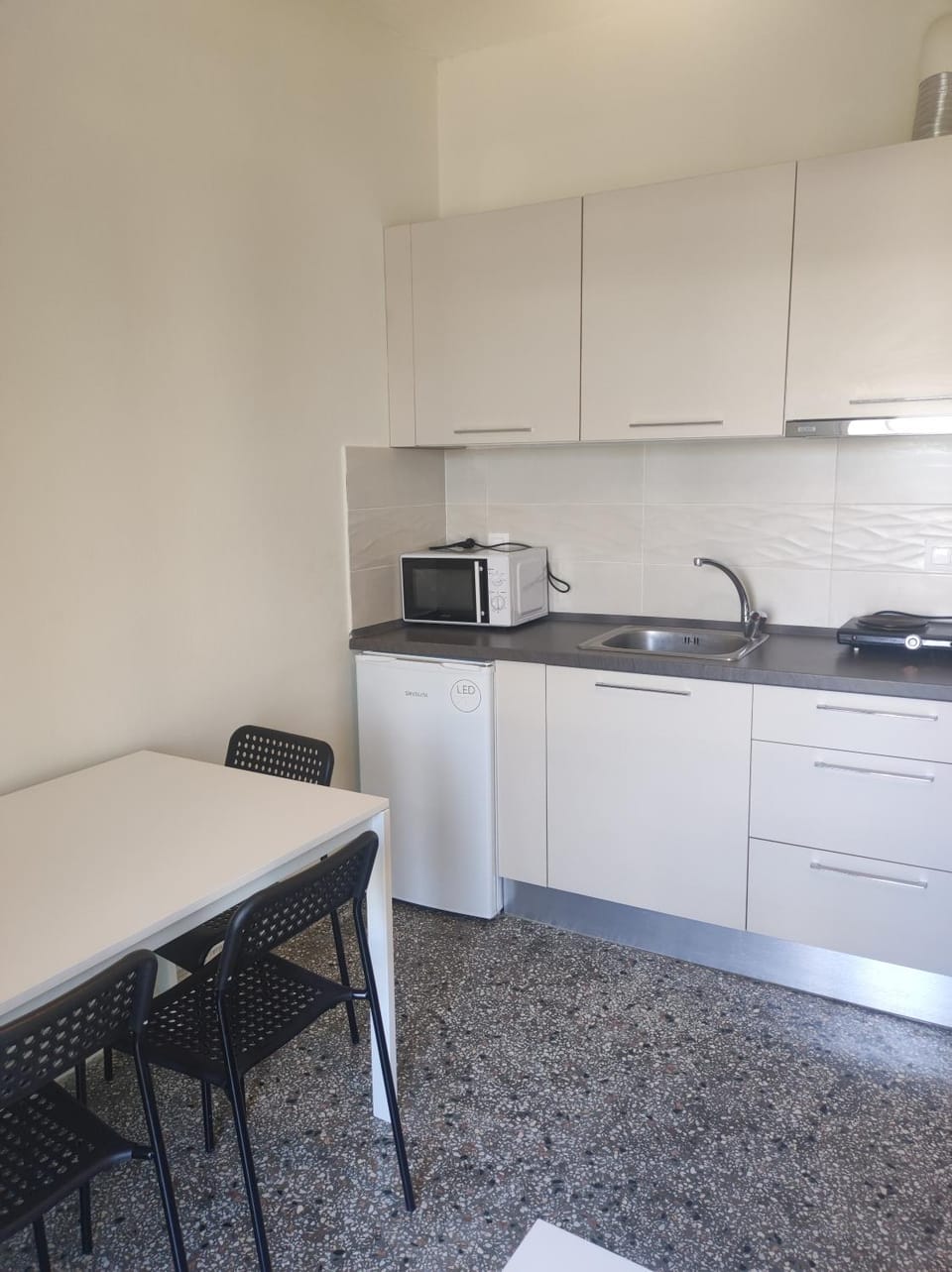 Kitchen or kitchenette, stove