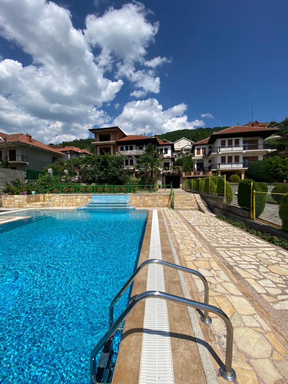 Property building, Day, Pool view, Swimming pool