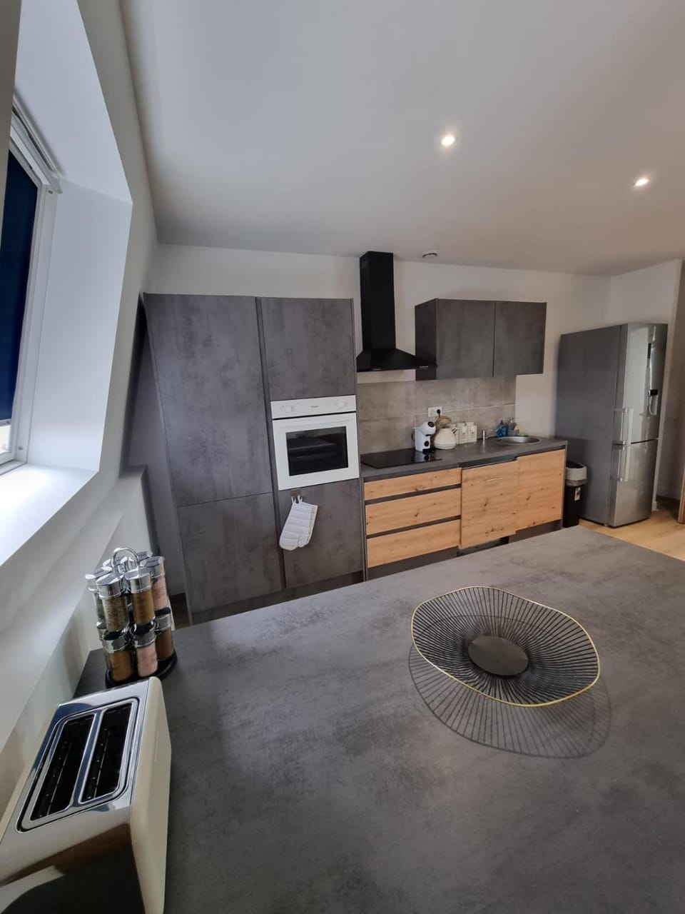 Kitchen or kitchenette, dishwasher, oven, stove, toaster