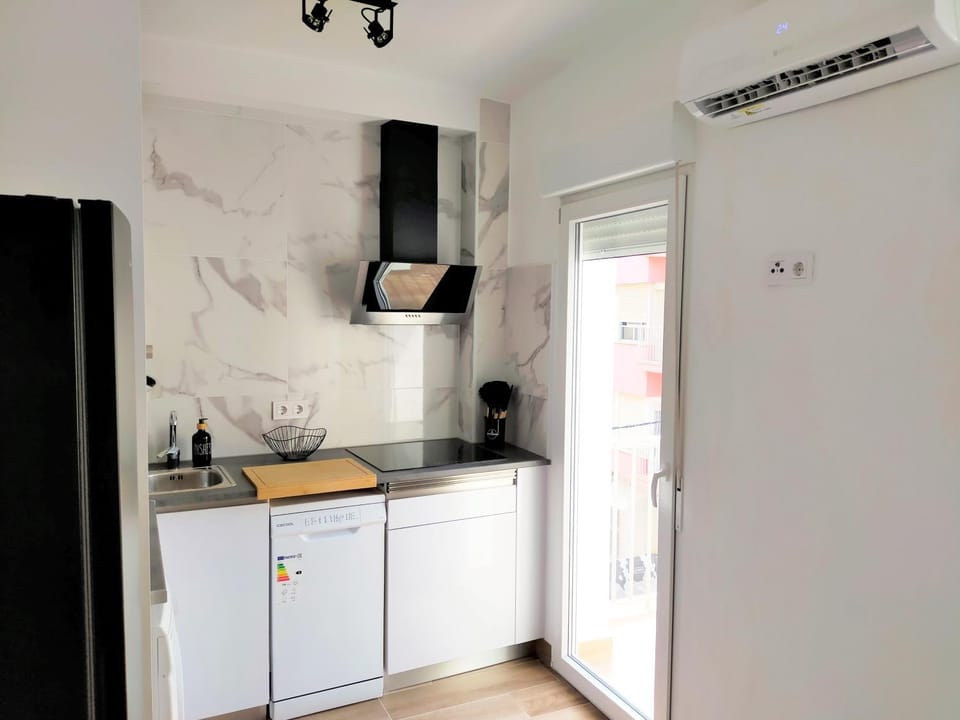 Kitchen or kitchenette, oven, stove