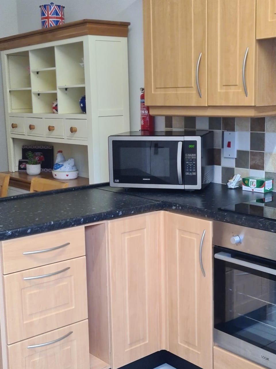 Kitchen or kitchenette, microwave