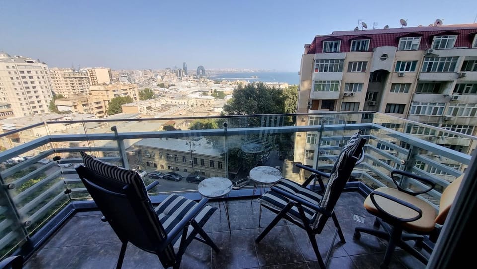 View (from property/room), Balcony/Terrace, Seating area, City view