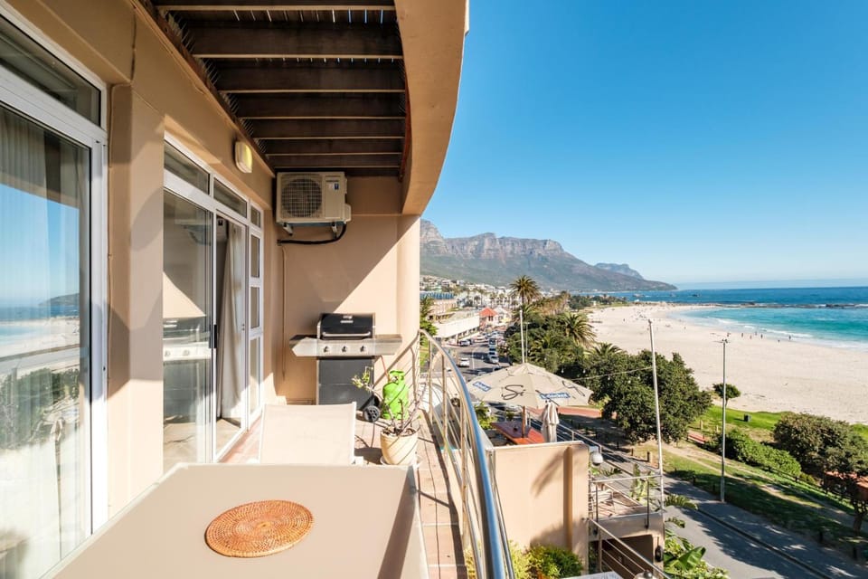 Property building, BBQ facilities, View (from property/room), Balcony/Terrace, Beach, Mountain view, Sea view
