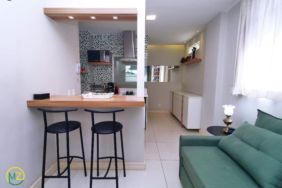 Modern living room and bedroom at post 4 in Copa Apartment in Rio de Janeiro