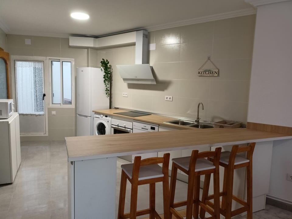 Kitchen or kitchenette, dishwasher, stove