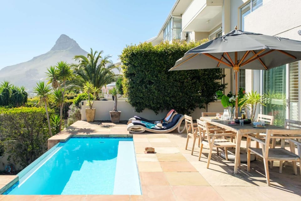 Property building, Patio, View (from property/room), Balcony/Terrace, Balcony/Terrace, Dining area, Garden view, Mountain view, Swimming pool, Swimming pool, sunbed