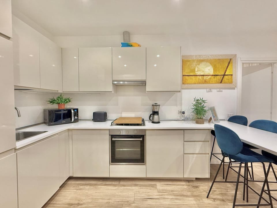 Kitchen or kitchenette, Dining area, oven, stove, toaster, kitchen