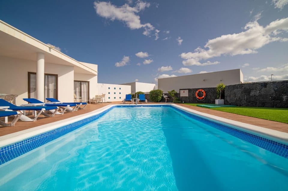 Property building, Living room, Swimming pool