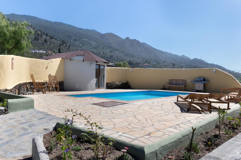 Property building, Living room, Swimming pool