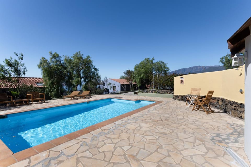 Property building, Living room, Swimming pool