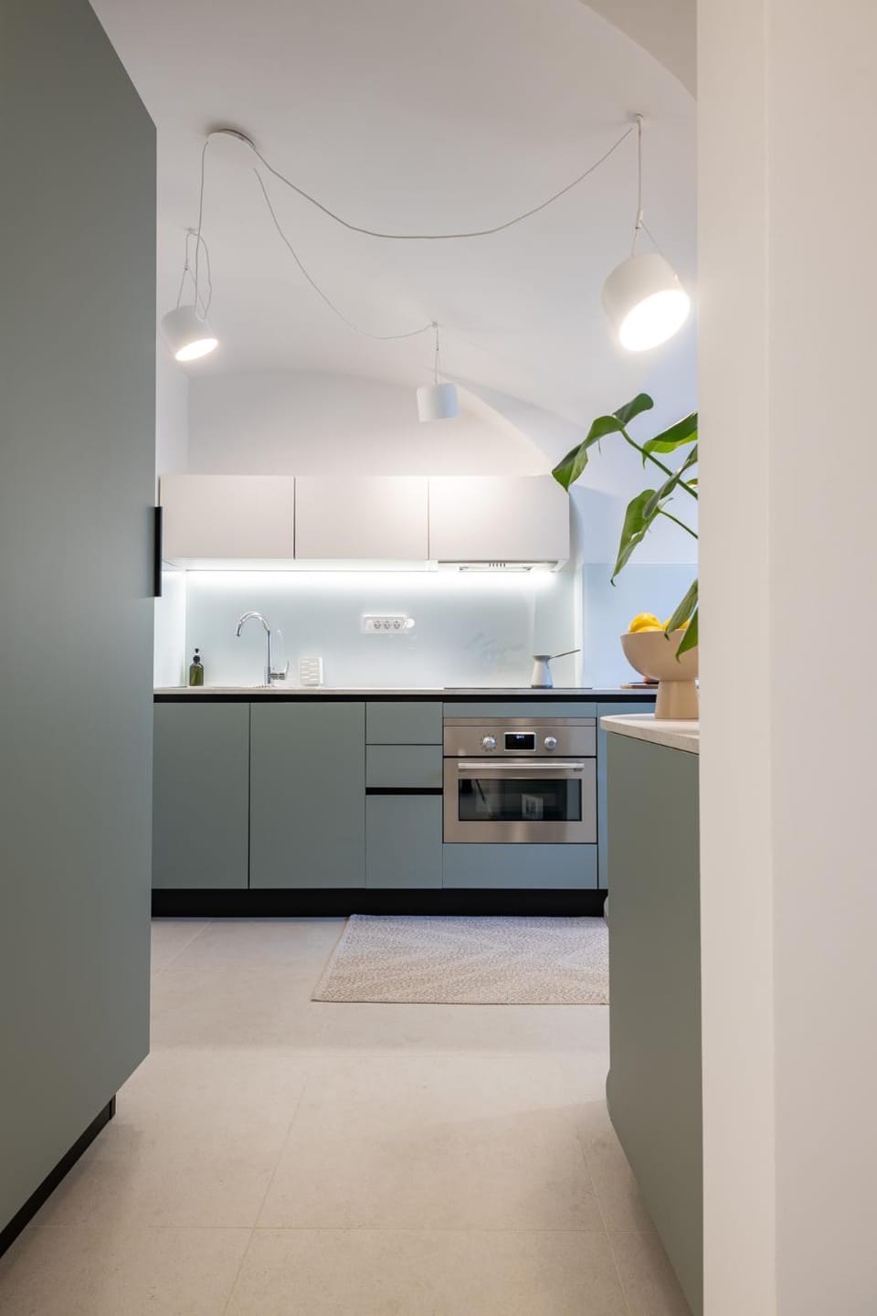 Kitchen or kitchenette, dishwasher, oven, stove