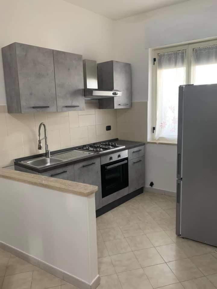 Kitchen or kitchenette, oven, stove