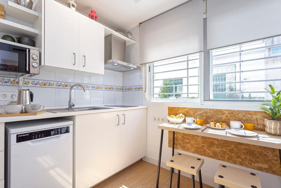 Dining area, dishwasher, microwave, stove, toaster
