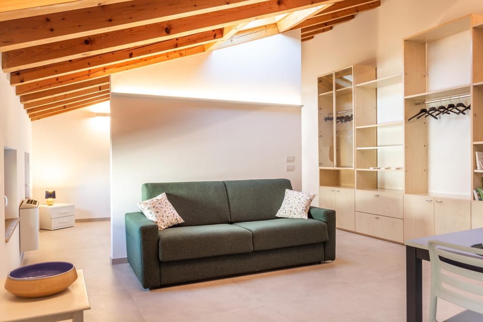Bed, Living room, Seating area