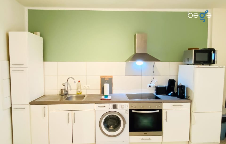 Coffee/tea facilities, Kitchen or kitchenette, dishwasher, oven, stove, toaster, washing machine