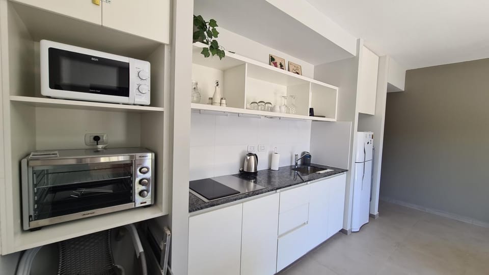 Kitchen or kitchenette, oven