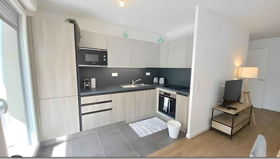 Kitchen or kitchenette, oven, stove, toaster
