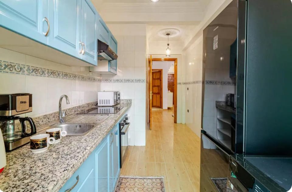 Kitchen or kitchenette, oven, stove