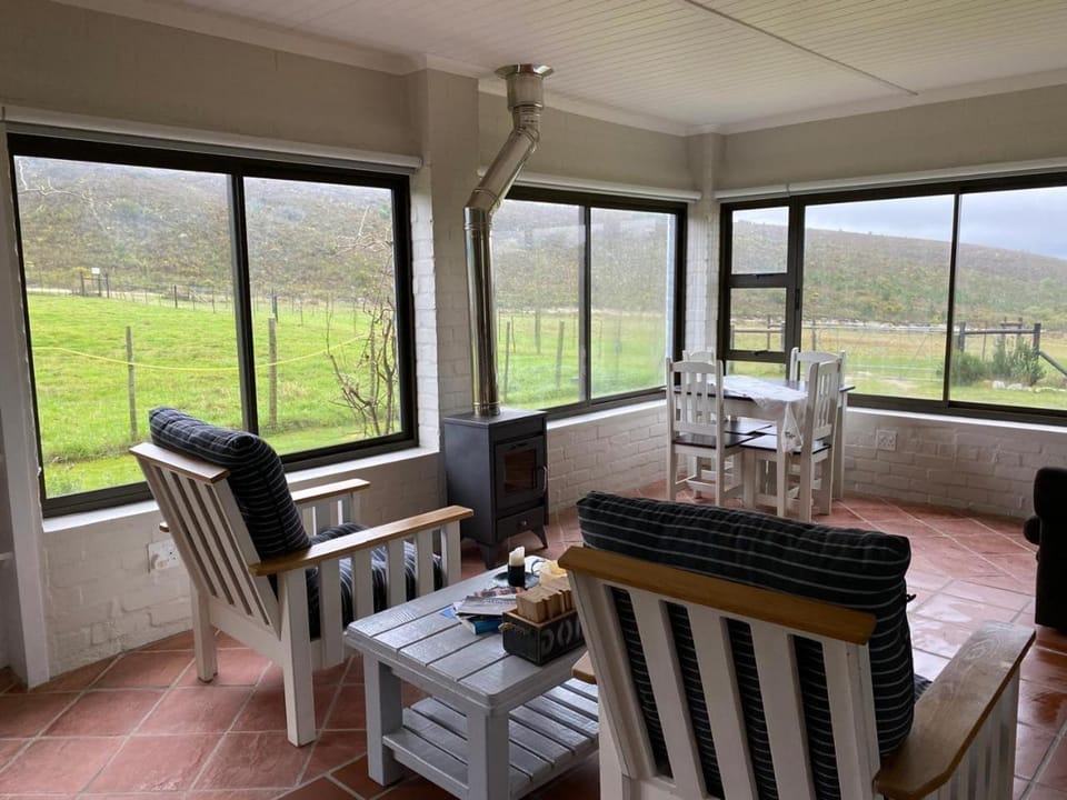 Natural landscape, View (from property/room), Living room, Seating area, Mountain view