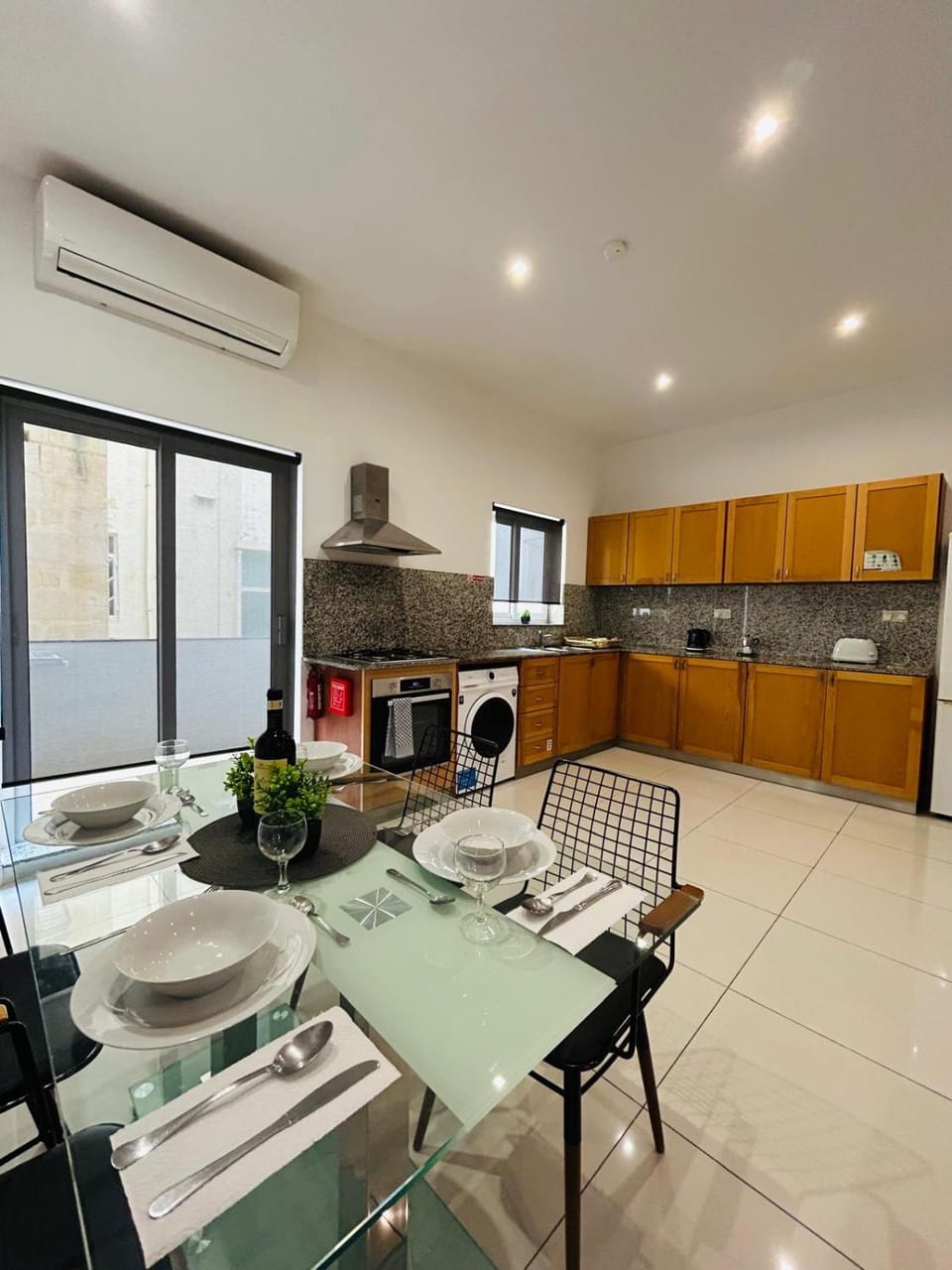Kitchen or kitchenette, Seating area, Dining area, stove, air conditioner