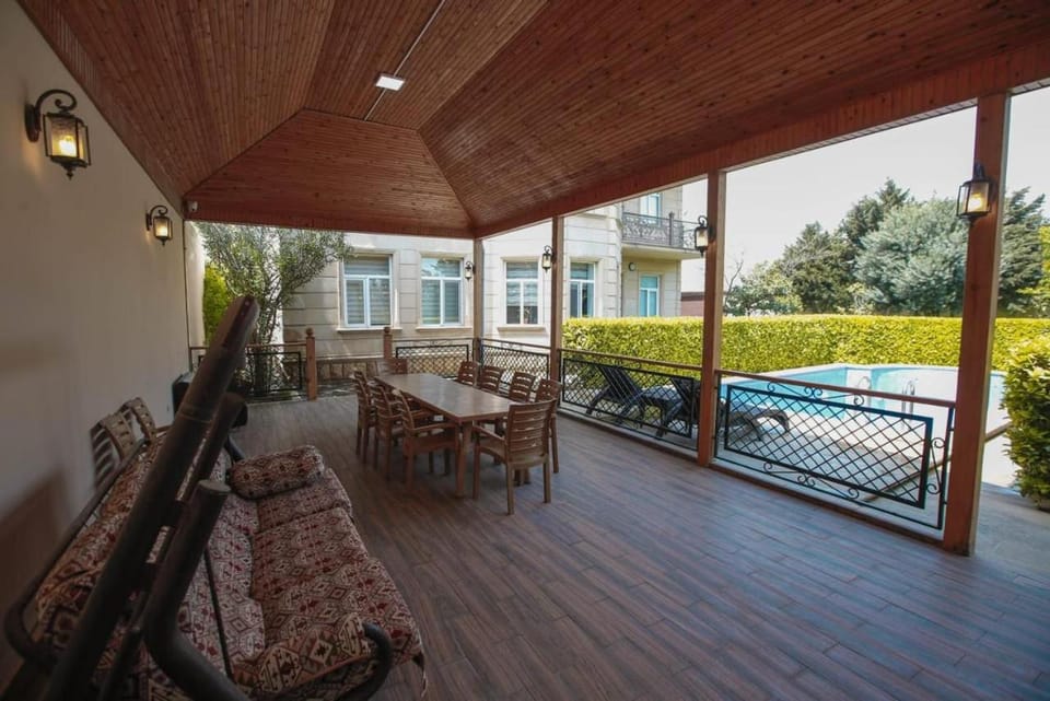 Patio, Day, View (from property/room), Lounge or bar, Seating area, Swimming pool, sunbed
