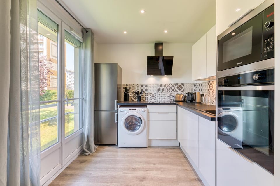 Kitchen or kitchenette, dishwasher, oven, stove, washing machine