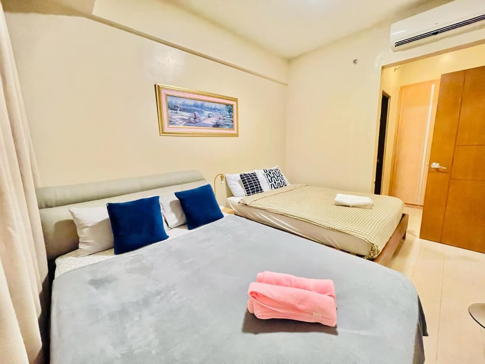 Mactan Newtown staycation near airport with pool access Apartment in Lapu-Lapu City