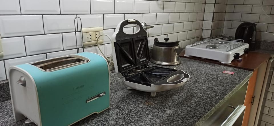 Kitchen or kitchenette, toaster