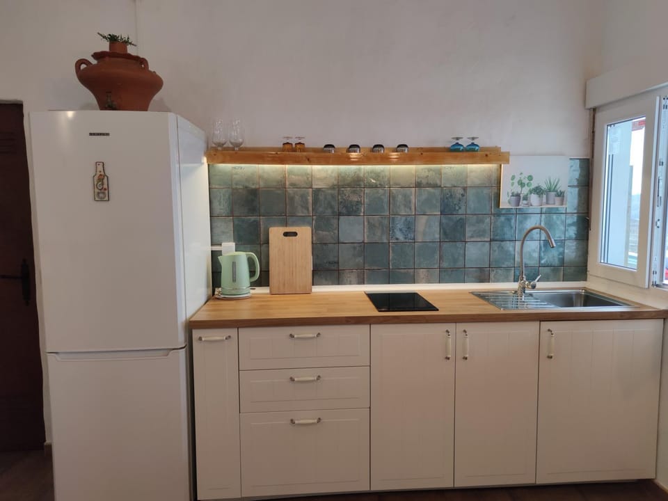 Kitchen or kitchenette, stove, toaster