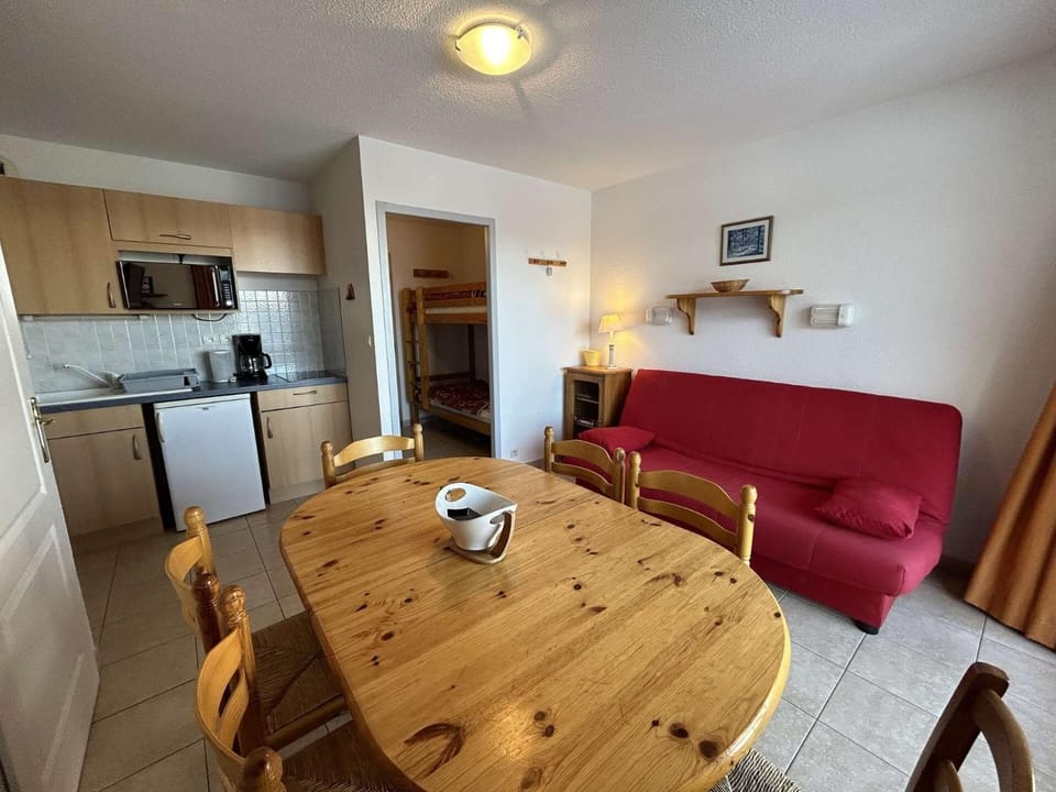Bed, Living room, fireplace, kitchen