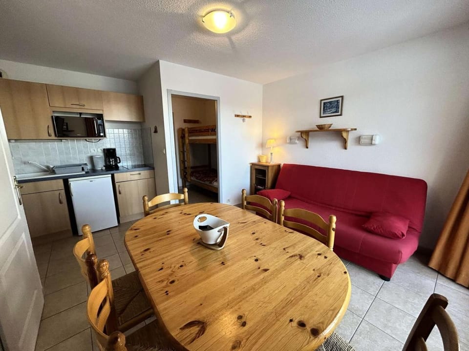 Bed, Living room, fireplace, kitchen