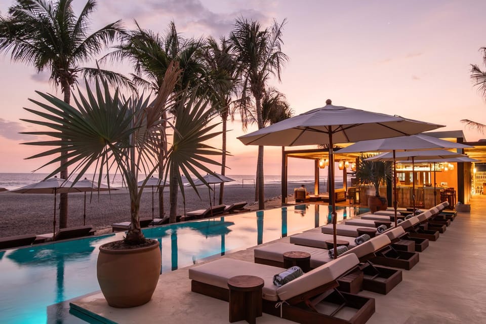 Patio, Natural landscape, Beach, Pool view, Sea view, Swimming pool, Sunset, sunbed