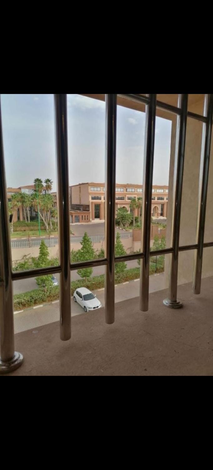 Appartement au coeur de Marrakech avec deux piscines et une charmante vue Apartment in Marrakesh