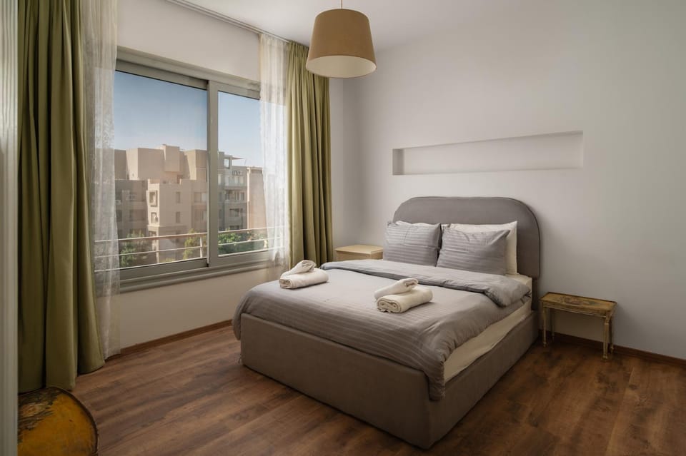Bed, Bedroom, flat iron, towels, wardrobe, air conditioner