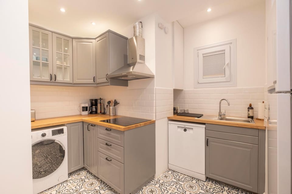 Kitchen or kitchenette, dishwasher, oven, stove, washing machine, dryer