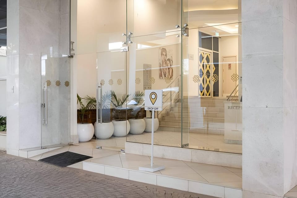 Lobby or reception, Text overlay, concierge, elevator
