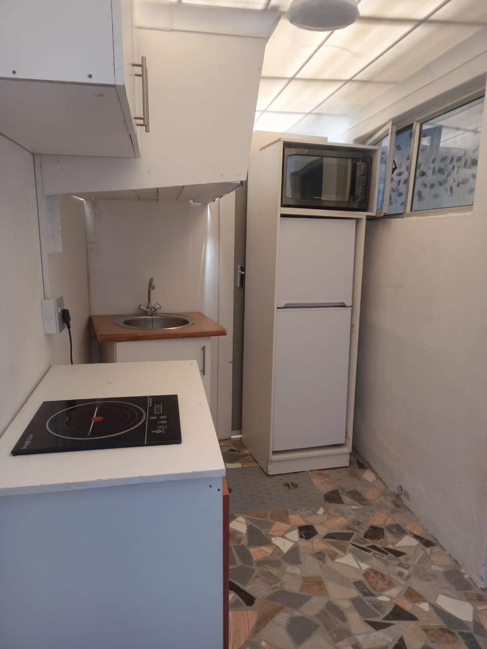 Kitchen or kitchenette, stove