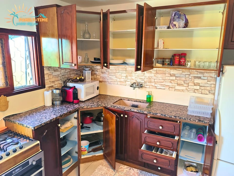 Kitchen or kitchenette, dishwasher, oven, stove, toaster, kitchen