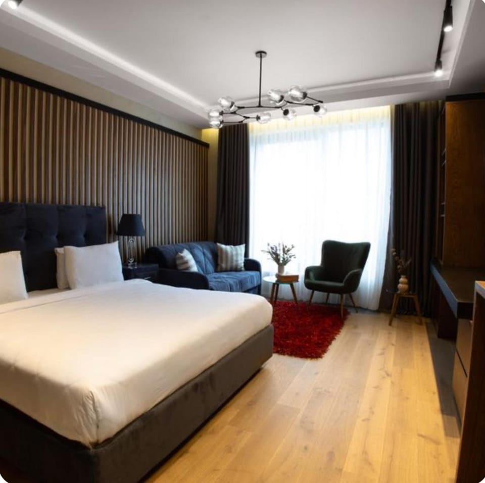 Bed, Living room, Photo of the whole room, Seating area, Bedroom