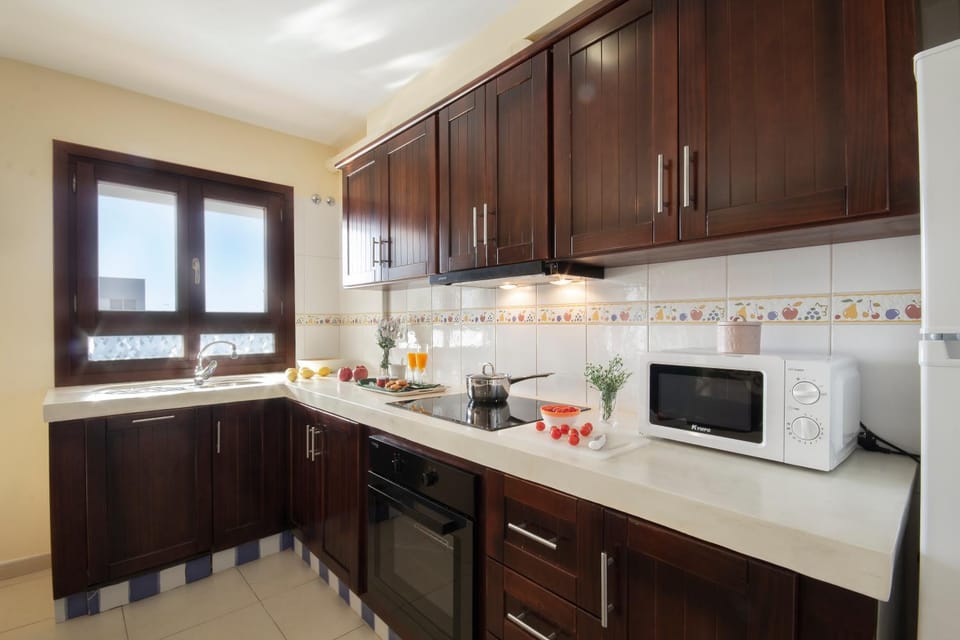 Kitchen or kitchenette, microwave, oven, kitchen