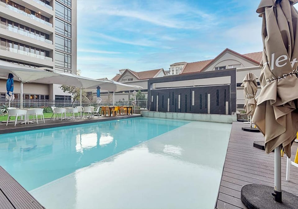 Property building, Pool view, Swimming pool, sunbed