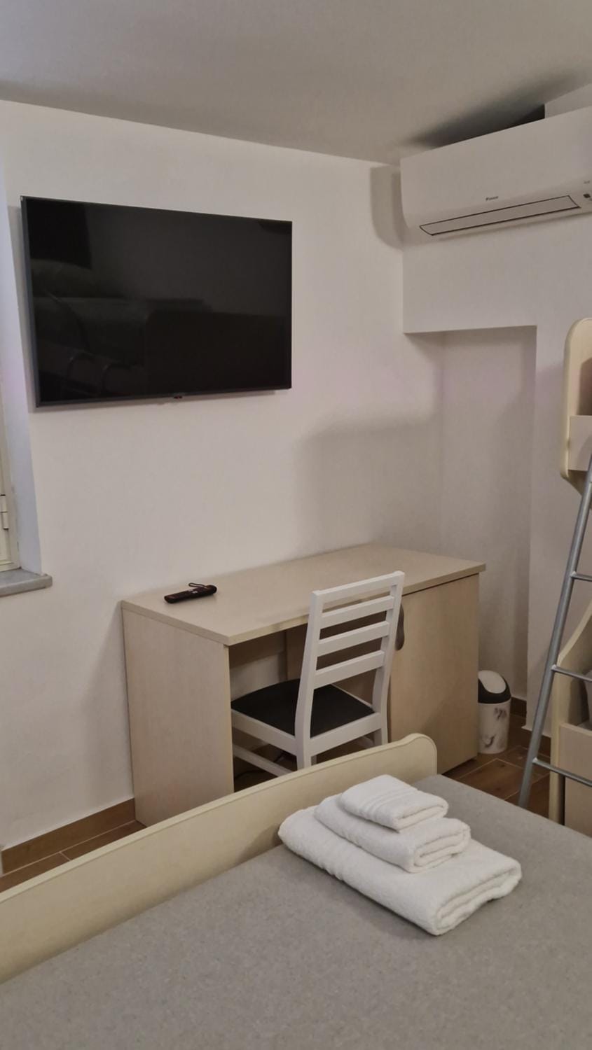 TV and multimedia, Italian breakfast, towels, wardrobe, air conditioner