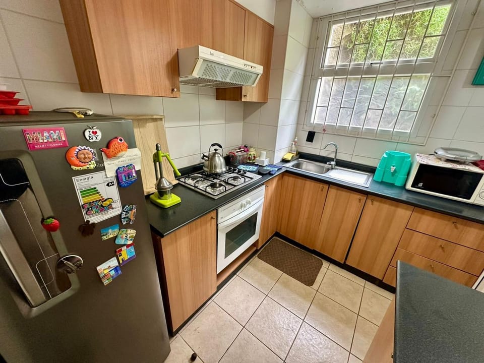 Kitchen or kitchenette, oven