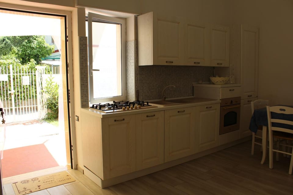 Kitchen or kitchenette, stove